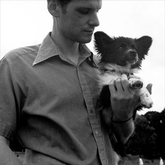Man holding dog